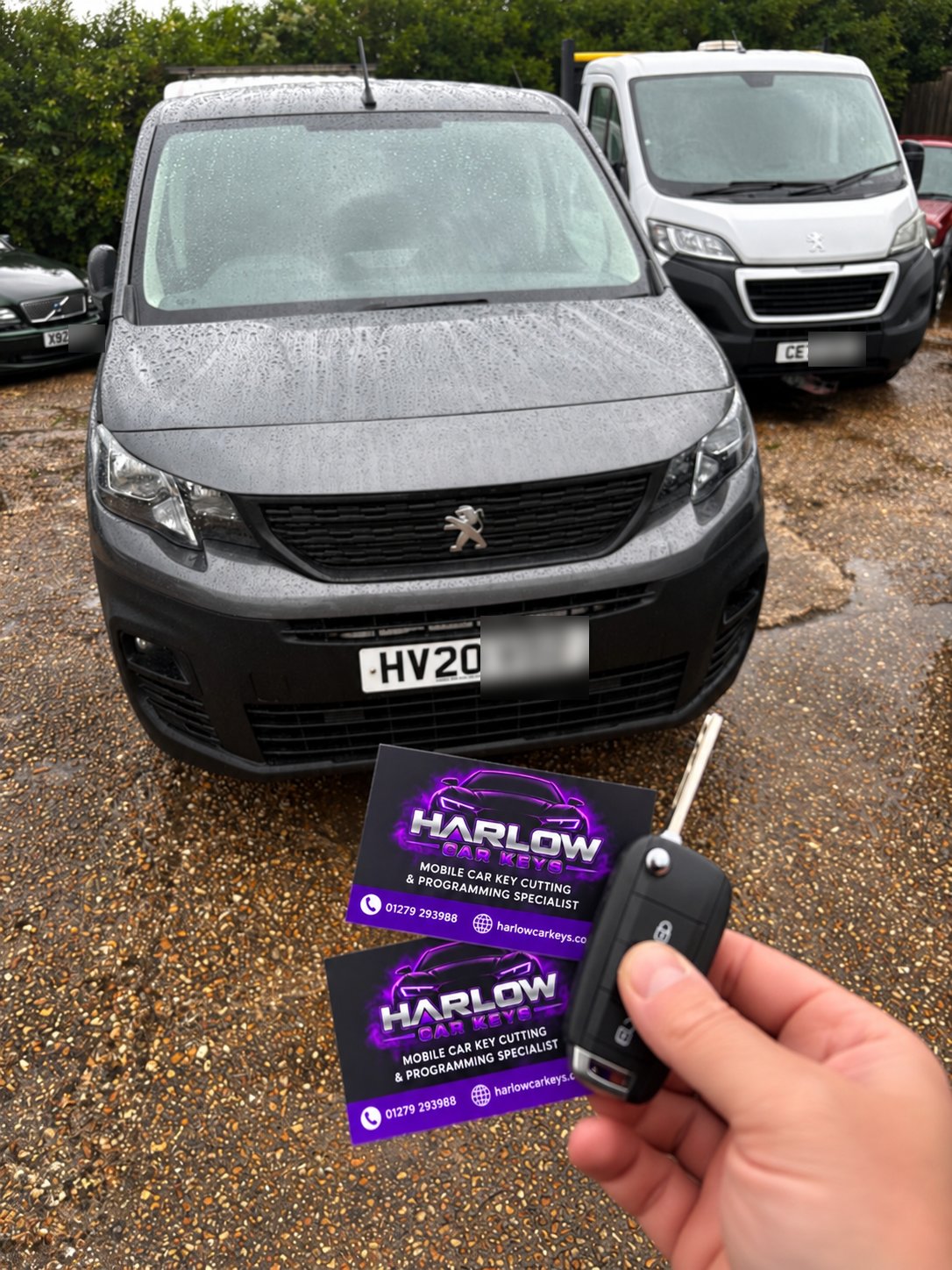 Newly made key for a 2020 Peugeot Partner in Staple Tye, Harlow after all keys were lost, held in front of the van with Harlow Car Keys business cards